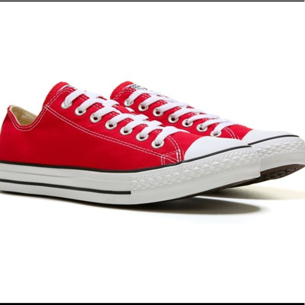 Red low top converse.